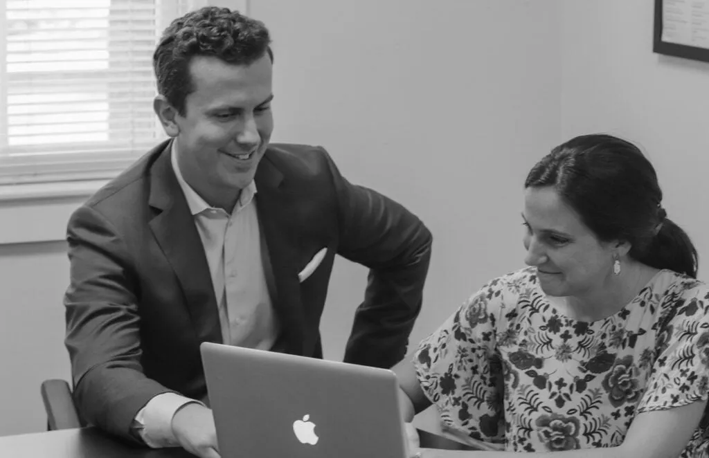 A financial adviser meeting with Justin Luther