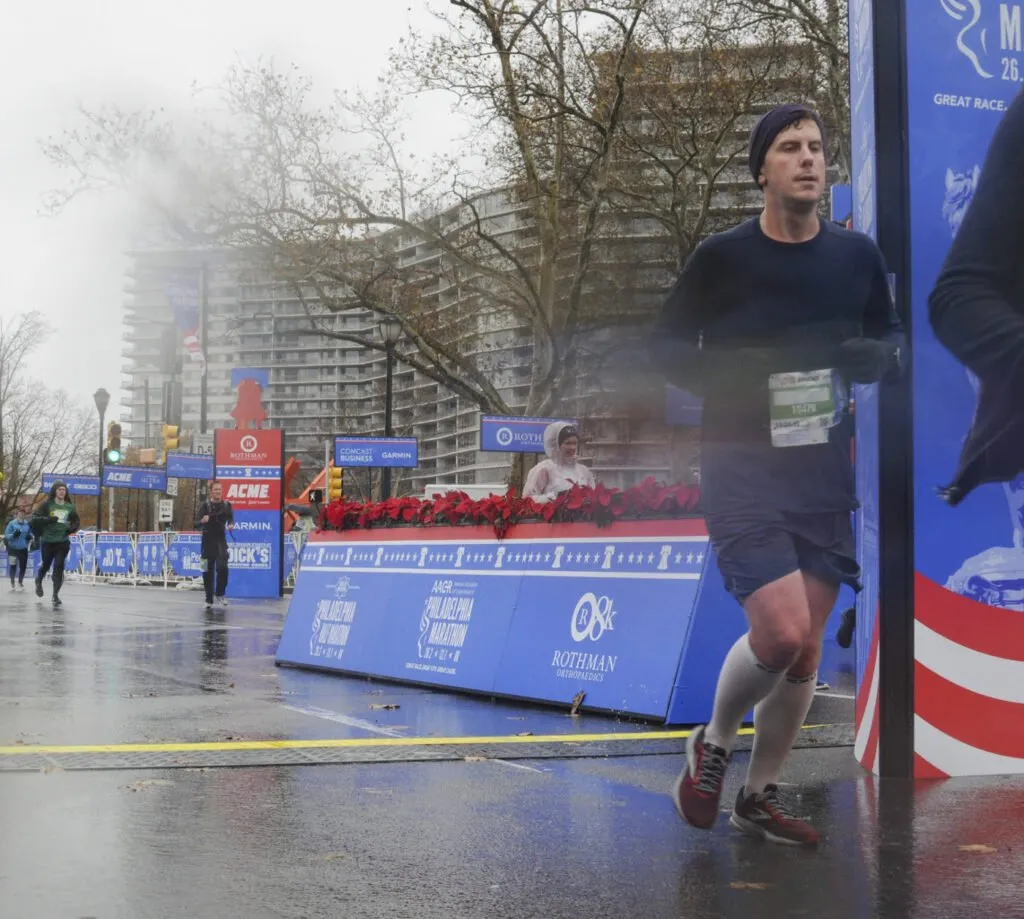 justin at the philly marathon finish line